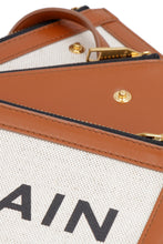 Load image into Gallery viewer, Canvas and leather clutch