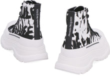 Load image into Gallery viewer, Tread Slick canvas high-top sneakers
