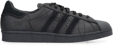 Load image into Gallery viewer, Superstar leather low-top sneakers
