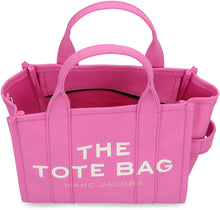 Load image into Gallery viewer, La traduzione di "The Small Tote Bag in canvas" dall'inglese (EN) all'italiano (IT) è: "La piccola borsa tote in tela".
