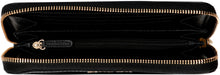 Load image into Gallery viewer, Jet Set Continental leather wallet

