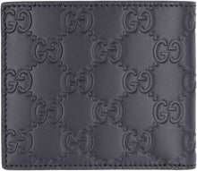 Load image into Gallery viewer, All over logo flap-over wallet
