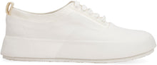 Load image into Gallery viewer, Rubber and leather low-top sneakers
